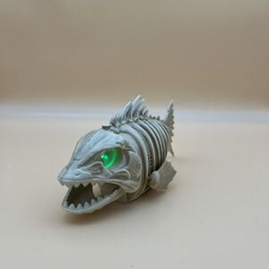 Pan Asian Creations Animated Skeleton Piranha Light Up Dead Fish Green works
